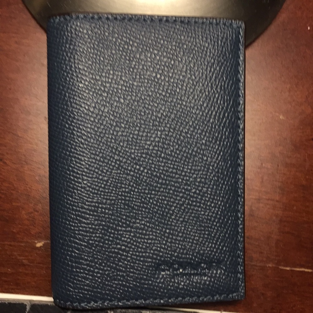 Coach Men's card wallet blue denim in color
